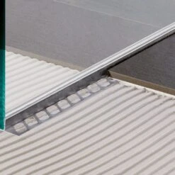 BLANKE Fliesenschiene Gefällekeil AQUA-KEIL GLAS Edelstahl Schwarz Matt 1200x37mm -Baustoffe Geschäft einbau blanke aqua keil glas fliesenschiene 14